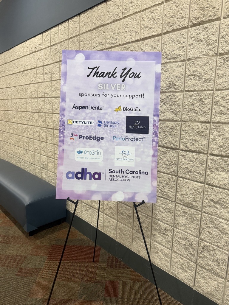 Silver sponsors sign at the 2026 Hygiene Symposium listing River Landing Dentistry