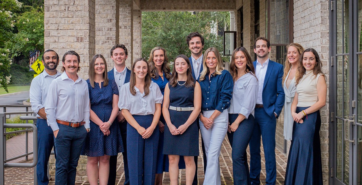 River Landing Dentistry dentists and clinical staff under the brick portico